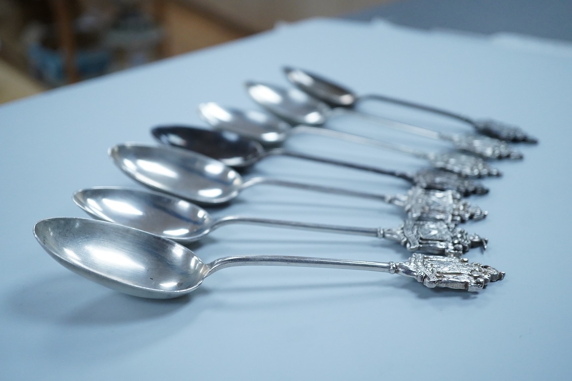A matched set of seven early 20th century silver spoons, with rat-tail bowls, the terminals modelled as the crest of the Worshipful Company of Joiners and Ceilers, various dates and makers including Mappin & Webb and Elk
